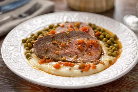 Roast Beef With Mashed Potatoes and Peas Stock Photos