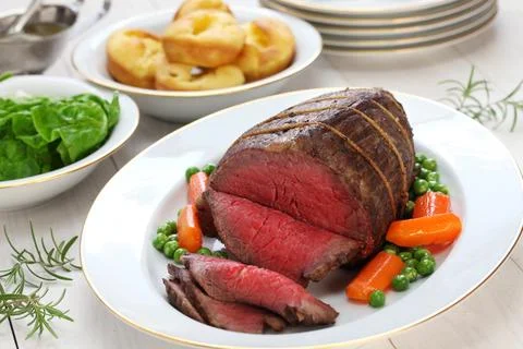 Roast beef with yorkshire pudding Stock Photos