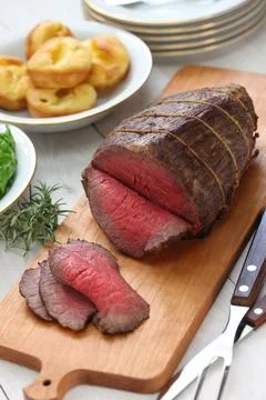 Roast beef with yorkshire pudding Stock Photos