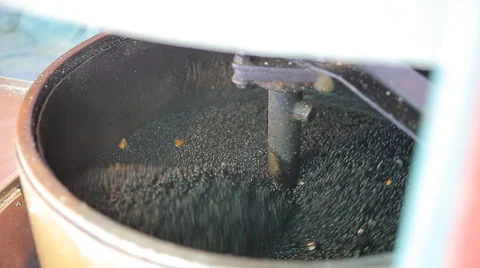 Roast chestnut in chestnut cooking machine with black stone in Asian cuisine foo Stock Footage 62777348