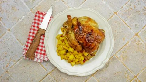 Roast chicken, close-up, on a plate Stock Photos