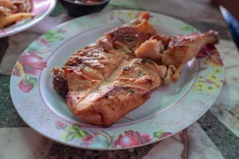 Roast chicken on dish Stock Photos