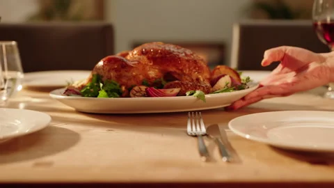 Roast Chicken placed on a table Stock Footage 254586564