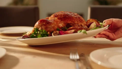 Roast chicken placed on table Stock Footage 254588589