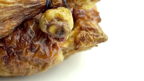 Roast chicken rotating macro Stock Footage 75521820
