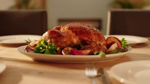 Roast Chicken on a table being carved Stock Footage 254593582