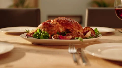 Roast Chicken on a table being carved Stock Footage 254594918