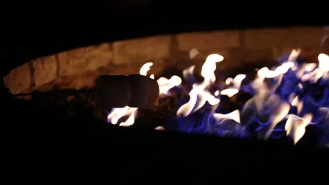 Roast Double Marshmallow Over Large Fire Slow Motion Dark Stock-Footage 167738850