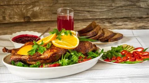 Roast duck with oranges Stock Photos