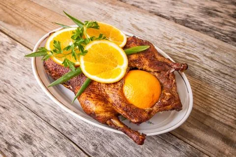 Roast duck with oranges Stock Photos