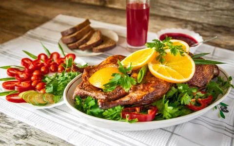 Roast duck with oranges Stock Photos