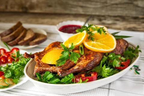 Roast duck with oranges Stock Photos