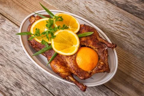 Roast duck with oranges Stock Photos