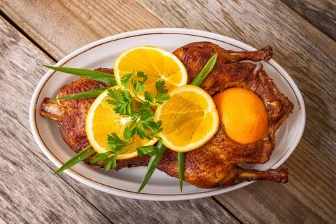Roast duck with oranges Stock Photos