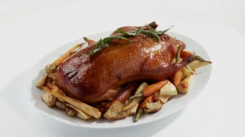 Roast duck with root vegetables Stock Footage 8571432