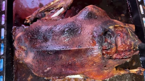 Roast goose cooked in the oven Video stock 223511262