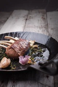 Roast lamb seared in the pan Stock Photos