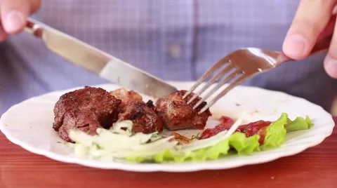 Roast meet eating Stock Footage 62020432