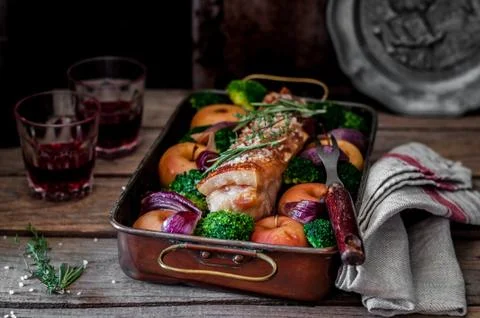 Roast Pork with Apples Stock Photos