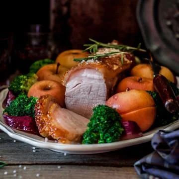 Roast Pork with Apples Stock Photos