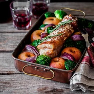 Roast Pork with Apples Stock Photos