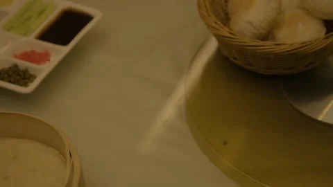 Roast Poultry Being Served with Sides at Restaurant Table in Beijing, China Stock Footage 345783622