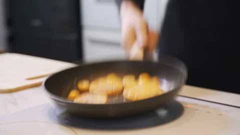 Roast the pumpkin in a frying pan. Stock Footage 103151589