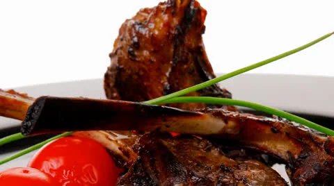 Roast ribs on plate 스톡 동영상 25542587