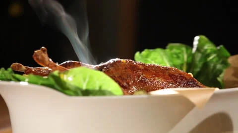 Roast Turkey on the table with smoke 03 Stock Footage 44218244