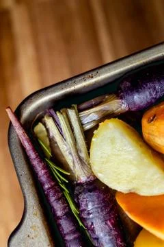 Roast vegetables in baking sheet Stock Photos