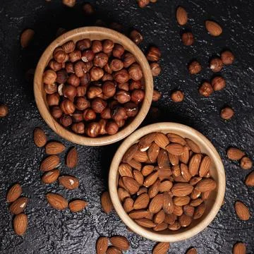 Roasted almonds and hazelnuts Stock Photos