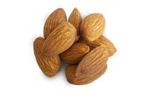 Roasted almonds isolated on white background, top view. Stock Photos