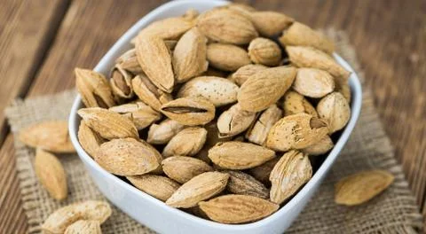 Roasted and salted Almonds (with shell) Stock Photos