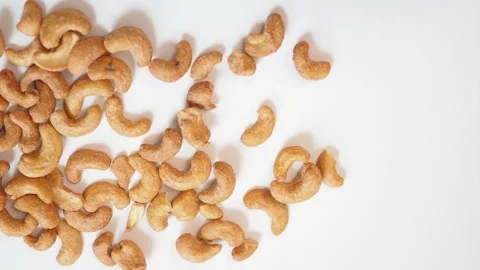 Roasted and salted cashew nut panning through Stock Footage 104234973