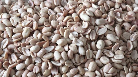 Roasted and salted peanuts. Pile of peanuts. Stock Footage 83948888