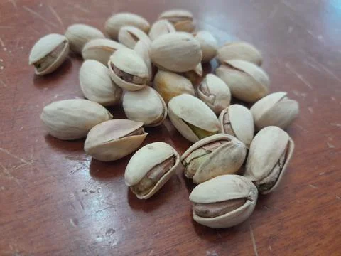 Roasted and salted pistachios in the shell Фото