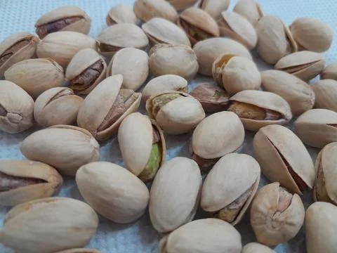 Roasted and salted pistachios in the shell. Stock Photos