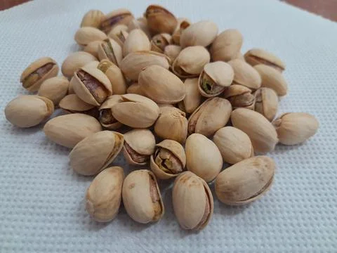 Roasted and salted pistachios in the shell Stock Photos