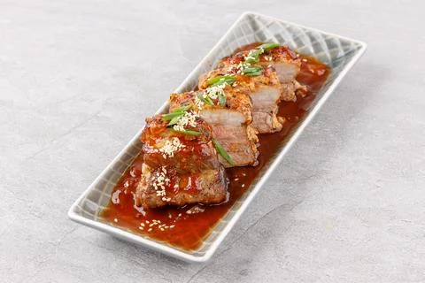 Roasted appetizing pork on a stone background studio food photo 5 Stock Photos