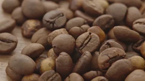 Roasted aromatic coffee beans are spinning Stock Footage 292901081