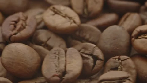 Roasted aromatic coffee beans are spinning Stock Footage 292901188