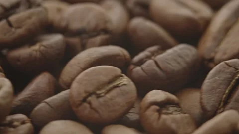 Roasted aromatic coffee beans are spinning Stock Footage 292901519
