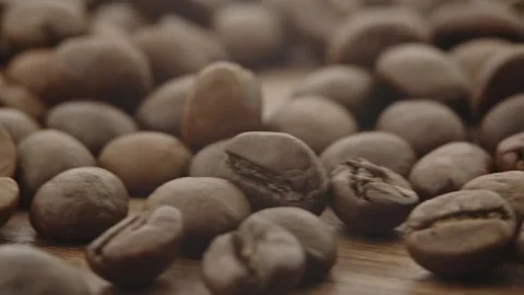 Roasted aromatic coffee beans are spinning Stock Footage 292901729
