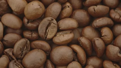 Roasted aromatic coffee beans are spinning Stock Footage 292902130
