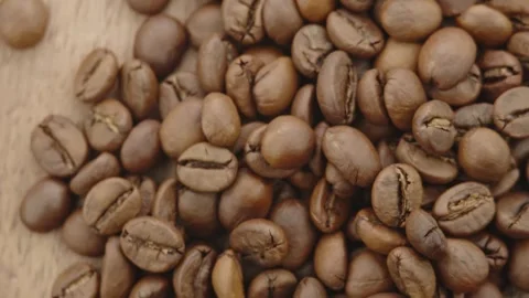 Roasted aromatic coffee beans are spinning Stock Footage 292902235