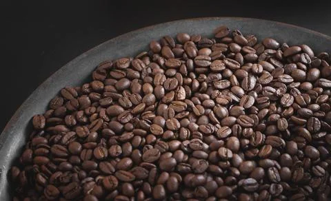 Roasted aromatic coffee beans as background Fotos de archivo