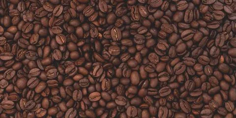 Roasted aromatic coffee beans as background Stock Photos
