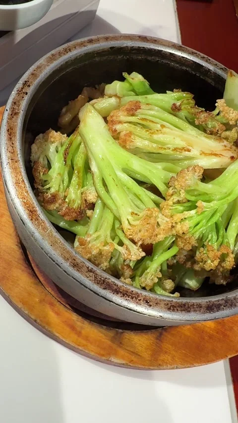 Roasted Baby Chinese Cabbage with Crispy Garlic Stock Footage 345398827