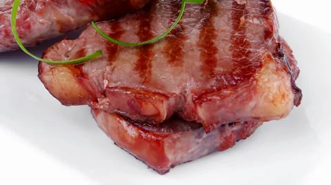 Roasted beef meat strips on white Vídeos de archivo 33484729