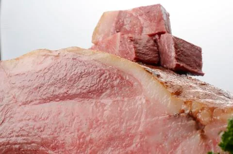 Roasted beef meat on white background in restaurant Stock Photos